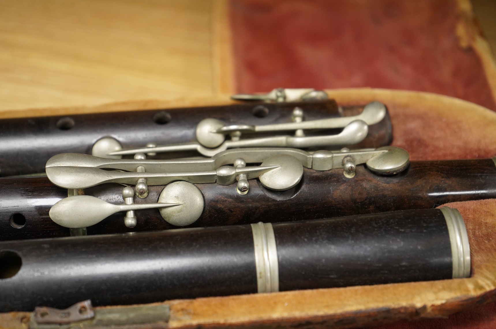 A 19th century cased ebony flute, with ten key system, unsigned, the case af